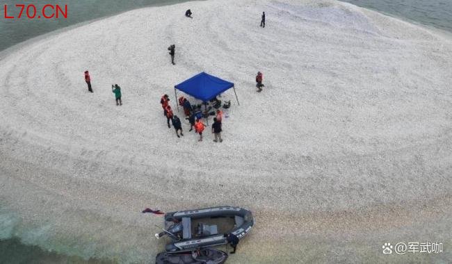 菲5名人员非法登礁 中国海警依法处置